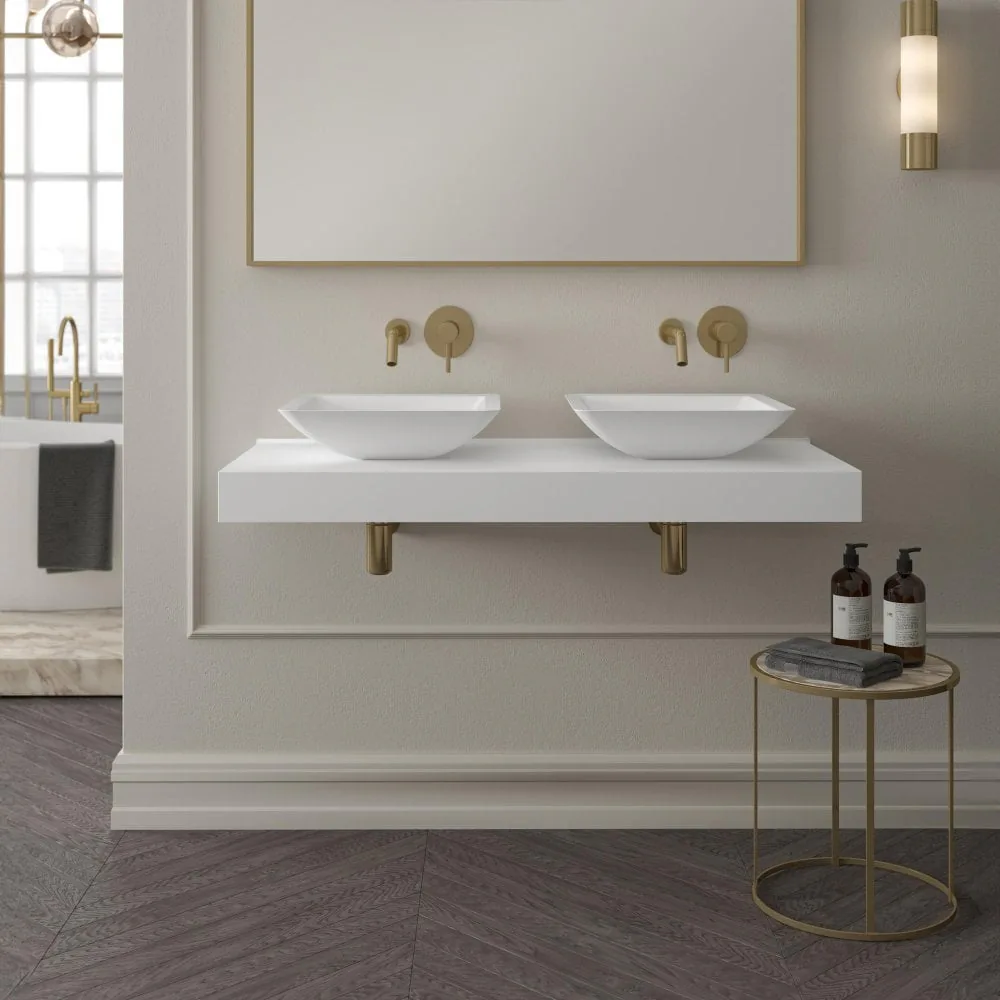 Two countertop basins on a wall-hung shelf, with mirrors above.