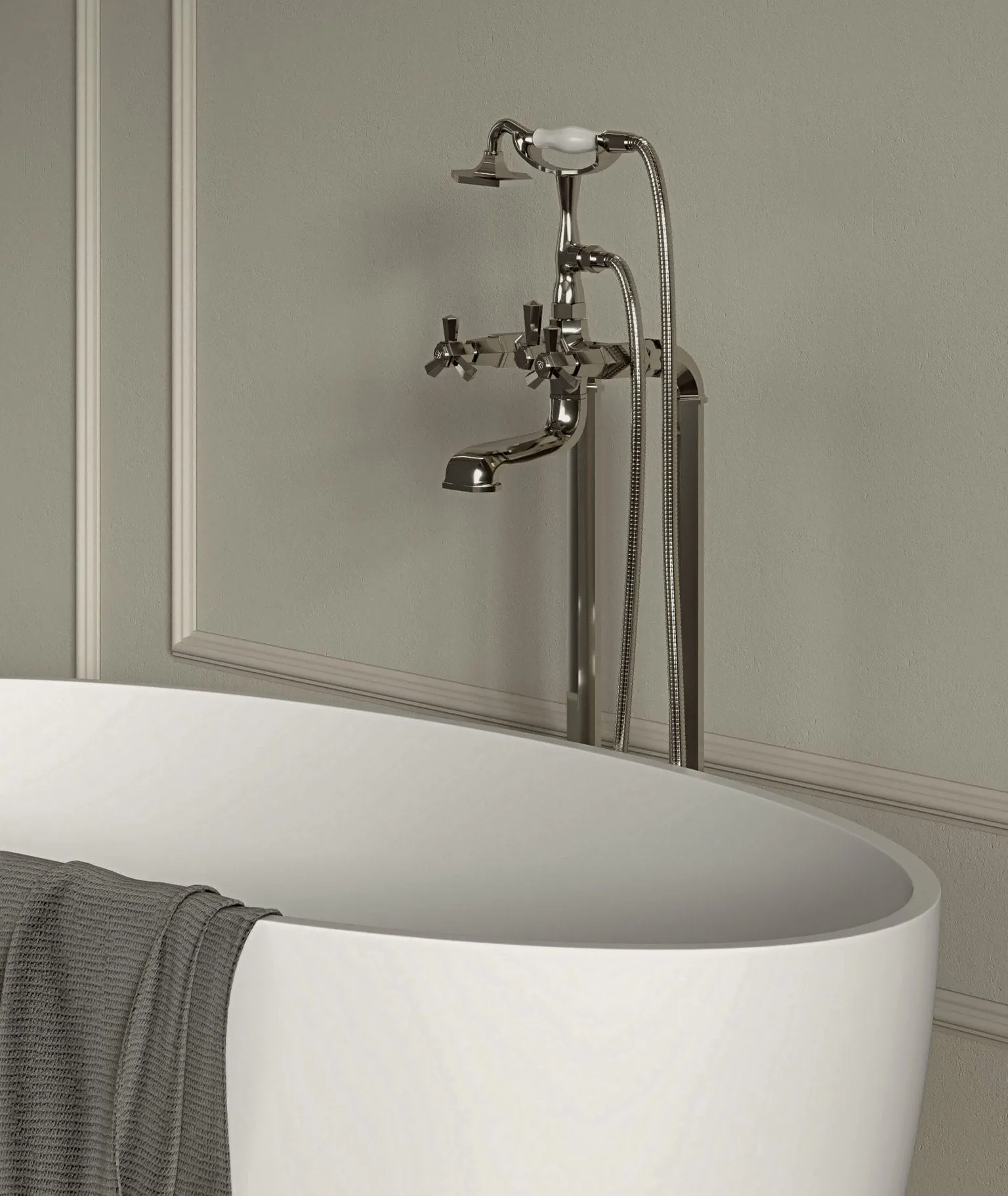 A freestanding bath with a floor-standing tap.