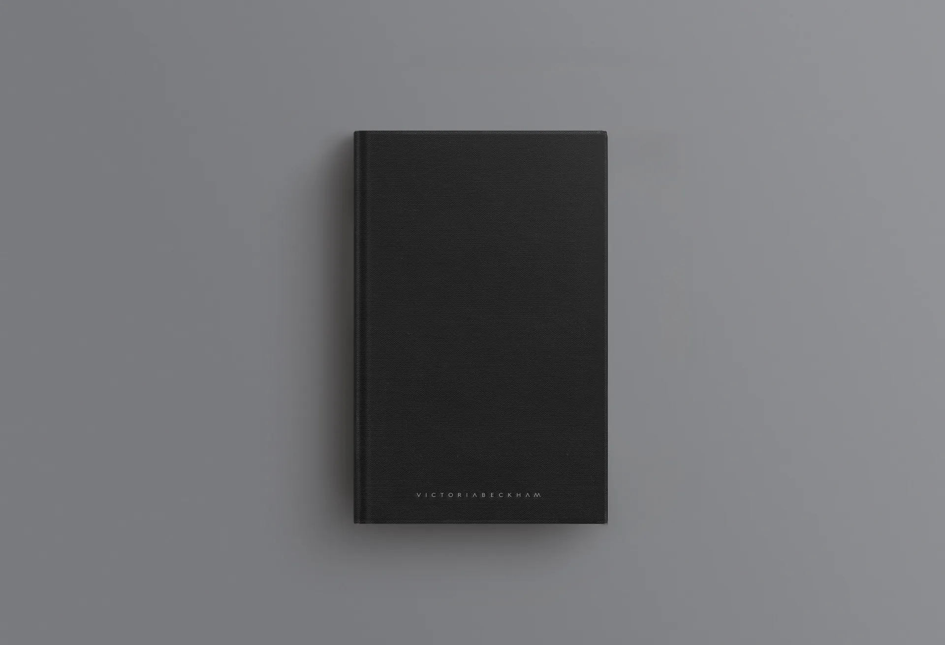 A black case photographed on a grey ground.